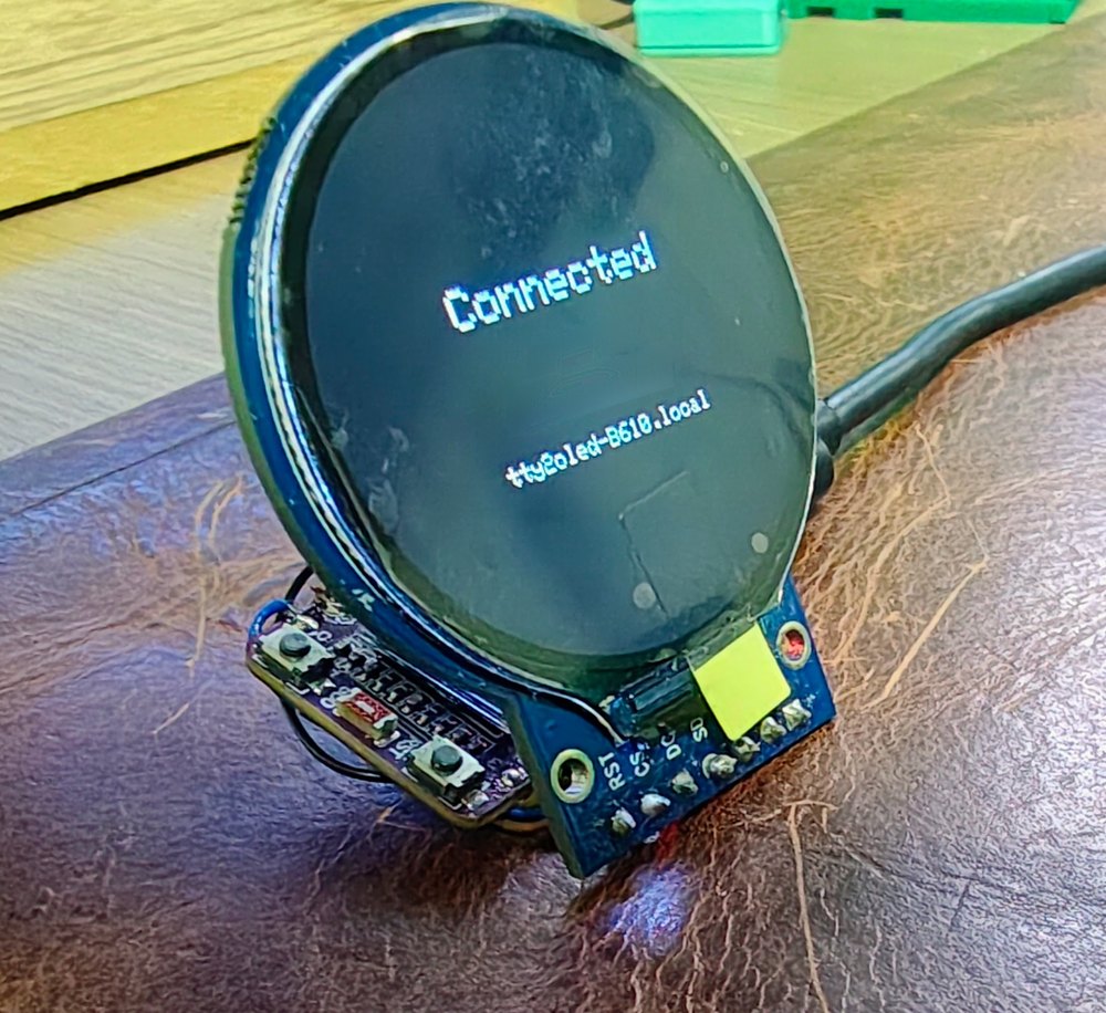 The round display showing Connected and its network name
